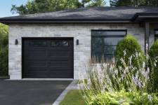 This garage door is a Standard+ Shaker-Flat XL, 9' x 8', Black, Clear windows.